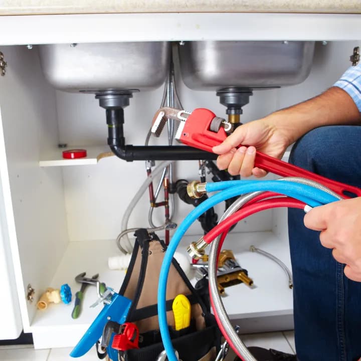 SM Plumbing Service licensed plumber at work in Singapore